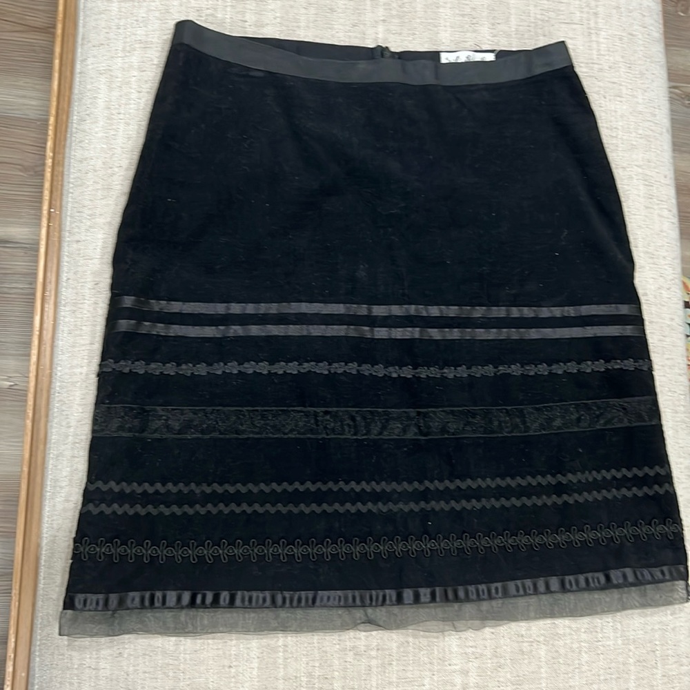 Black, fine wale corduroy knee length skirt. Size 6.  Will’s River Co.